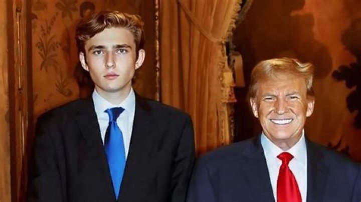 Barron Trump Dwarfed By Towering Father Donald